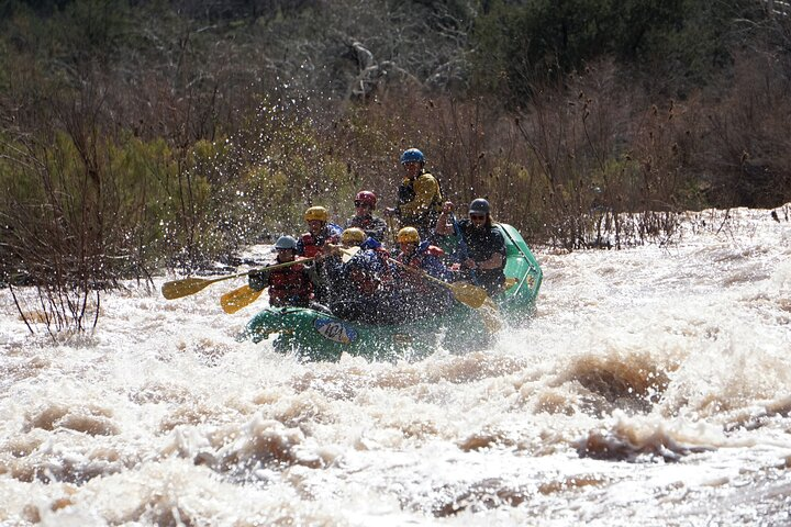 Rafters powering through big whitewater on Oued Ahansal